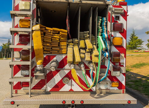 Modern Fire Track. Back view of the fire truck, hoses and equipment, red fire engine, special equipment