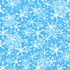 Snowflakes falling seamless pattern on blue background