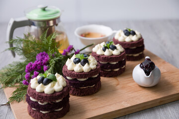 Blueberry cheesecake on wooden table, birthday party, corporate event or wedding celebration