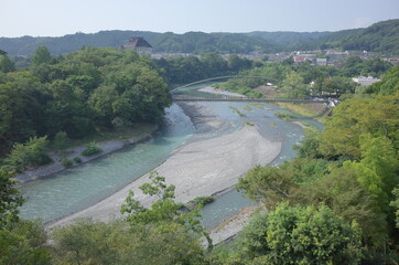 tama river flowing in ome city, tokyo