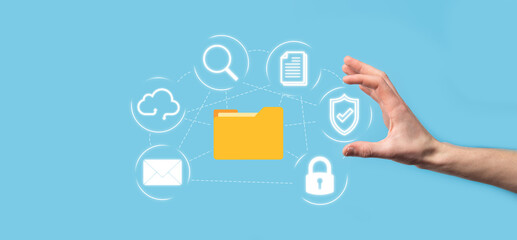 Document Management System DMS .Businessman hold folder and document icon.Software for archiving,...