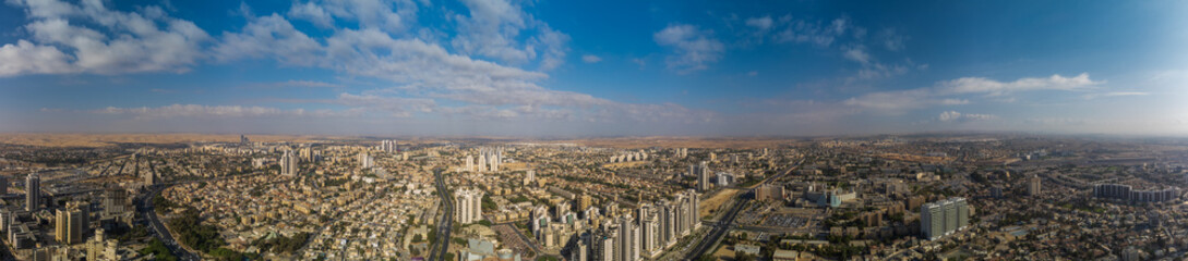 Fototapeta na wymiar Super wide panorama of city from the sky at big height