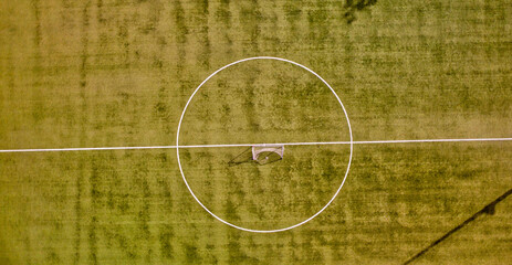 Soccer field as seen from a flying drone. High viewpoint. © jovannig