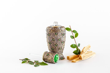 Agar wood oil fragrances or arabian oud perfume in silver bottle