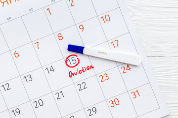 Ovulation day mark in calendar with ovulation home test