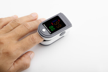 Close up of Finger in an Oximeter Device used to measure pulse rate and oxygen levels