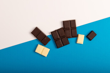 Chocolate on white and blue background