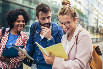 College students studying on university campus outdoor