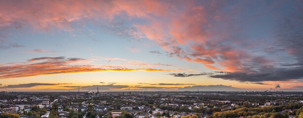 Romantic sunset over the skyline of Duisburg in autumn