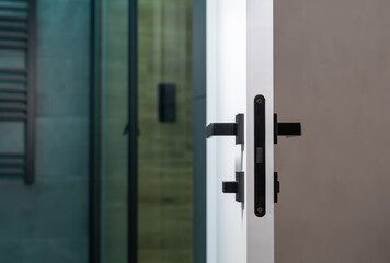 Close focus to the latch on a bathroom interior door