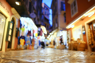 european city street blurred background outside summer buildings