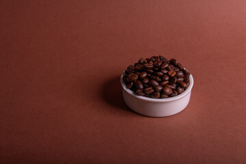 Coffee been on brown background