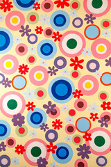 Bright contrast colorful round circular shape and flowers blossom bloom pattern classic vintage design abstract decorative art style texture on yellow wall plain background, High resolution wallpaper