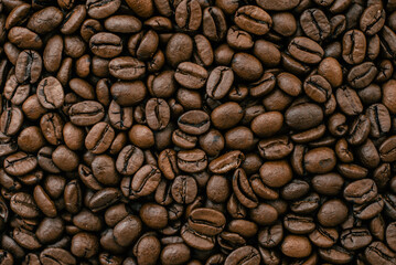 Fresh roasted coffee beans pattern, texture, goog morning background