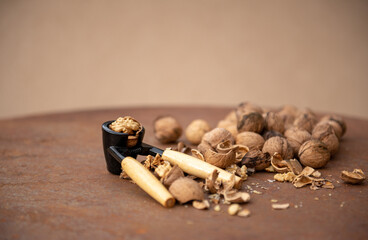 Walnuts on rustic plate at Autumn