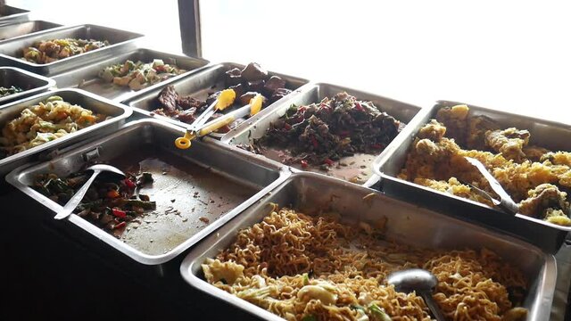 Various kinds of traditional Indonesian food in a food stall