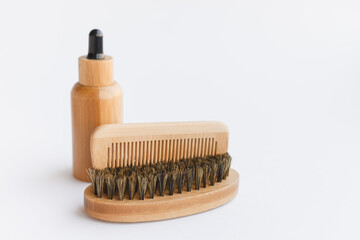 Fototapeta na wymiar Set of eco-friendly wooden shaving accessories isolated on white background