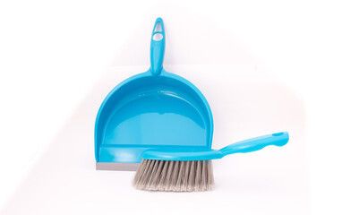 Scoop and brush blue cleaning kit isolated on white background