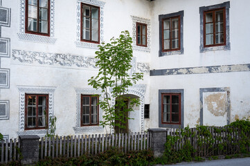 Fototapeta premium Old white abandoned house, cloudy day in summer