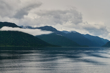 Beautiful panoramic view at Kucherla mountain lake and mountain range. Belukha national park, Altai...