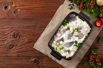 Herring fillet salad in cream with apple.