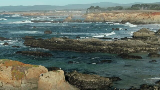 Aerial: Glass Beach at Fort Bragg on Mendocino Coastline, California, USA