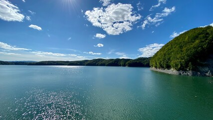 Lake Solinskie with rocky shores covered with dense coniferous forest