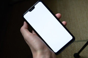 hand holding smartphone