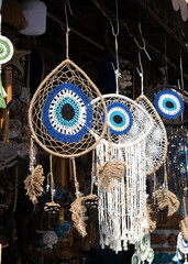 Decorative evil eye beads for sale. Hanging in front of the store.