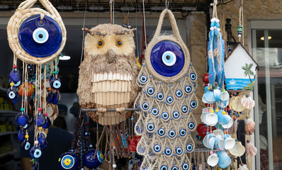 Decorative evil eye beads for sale. Hanging in front of the store.
