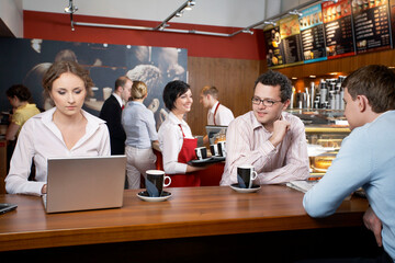 Business people in coffee shop