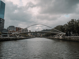 Incredible views of Bilbao. Skyscrapers, river and buildings of the País Vasco (España). Modern, fishing and industrial city of Spain. Spanish lifestyle, modern European city.