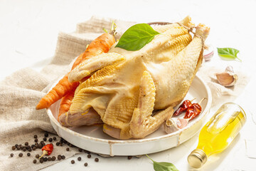 Whole free-range chicken poultry. Organic farm food, trendy hard light, dark shadow