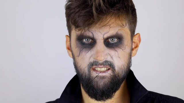 a man with undead makeup for Halloween
