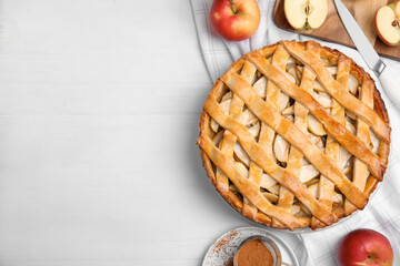 Delicious traditional apple pie on white table, flat lay. Space for text - Powered by Adobe