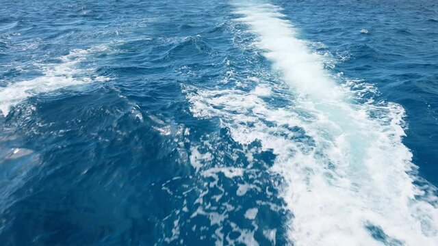 Back view of the sea washing from catamaran. Maritime cruising holiday vacation on motoryacht. Travel destinations. Summer vacation