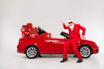 Full length body size view of attractive funny Santa dancing fooling near car having fun eve day isolated over grey color background