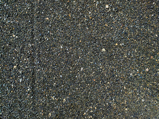Fine texture of dark natural granite coal mineral