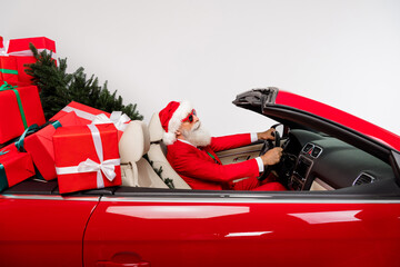 Photo of trendy look driver santa grandpa steering wheel deliver gifts wear costume isolated white color background