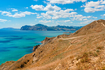 Fototapeta na wymiar Amazing landscape with hills and mountains on Cape Chameleon in Crimea