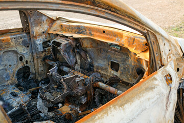 The car after the fire. Iron parts of a burnt car
