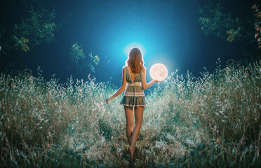 Fantasy silhouette girl holds magical ball planet galaxy. night nature dark forest. Mystic moon...