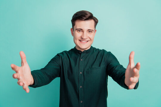 Photo of positive guy open arms hug you isolated teal background