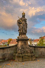 Fototapeta na wymiar Scenic view of Statue of St. Kunigunde at the bridge near Old Town Hall of Bamberg, Bavaria, Germany.