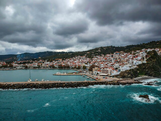 Fototapeta premium Dramatic winter scenery over the famous Skopelos town also known as chora in Skopelos island, Sporades, Greece