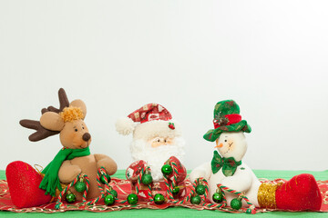 Christmas Decoration - Three different Snowmen dressed in Christmas time clothes