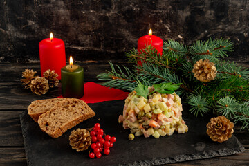 Traditional Russian New Year salad Olivier, New Year's or Christmas salad serving