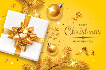 Fototapeta na wymiar Horizontal banner with gold Christmas symbols and text. Christmas tree, gift, serpentine and snowflakes on yellow background.