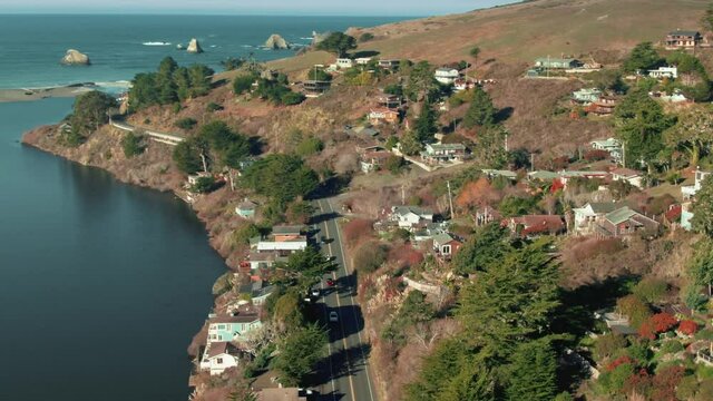 Aerial: Sunrise over Jenner and the Russian River. Mendocino, California, USA
