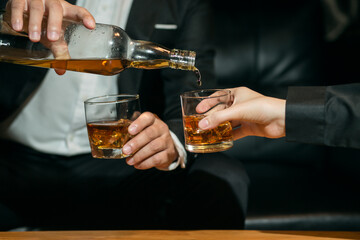 Businessmen in suits drinking  Celebrate whiskey